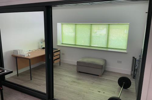 Large office space with desk, comes with kitchen and parking space.