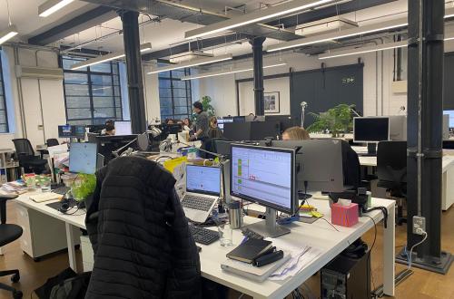 Desk space in friendly open plan architects' office